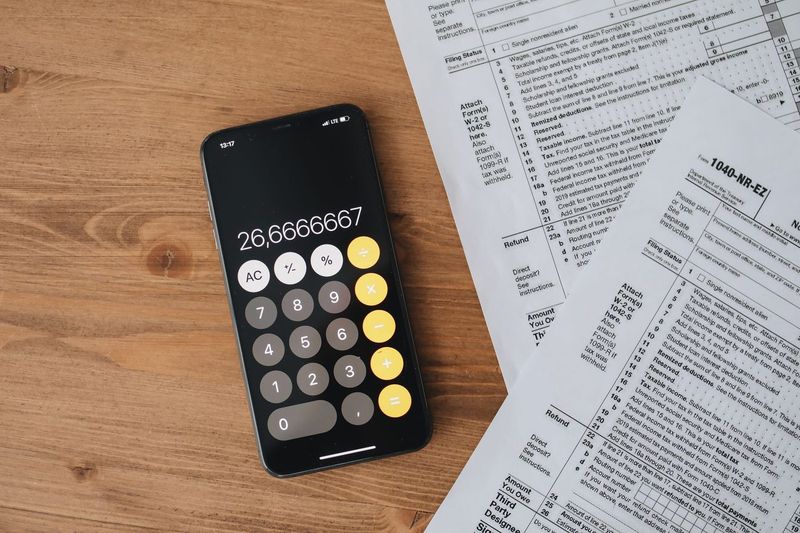 Paying the spousal surcharge or buying my own plan